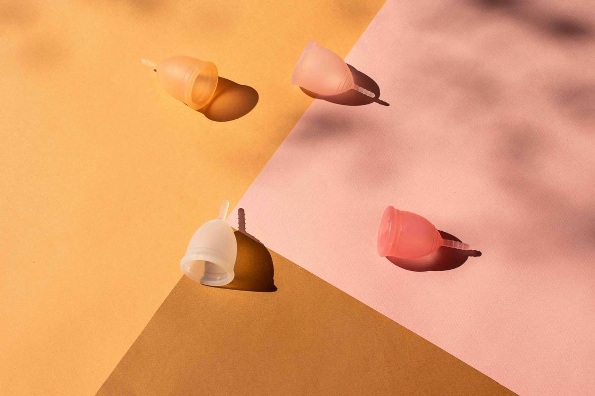Side-by-side comparison of cheap vs premium makeup sponges showing absorption, texture, and blending results